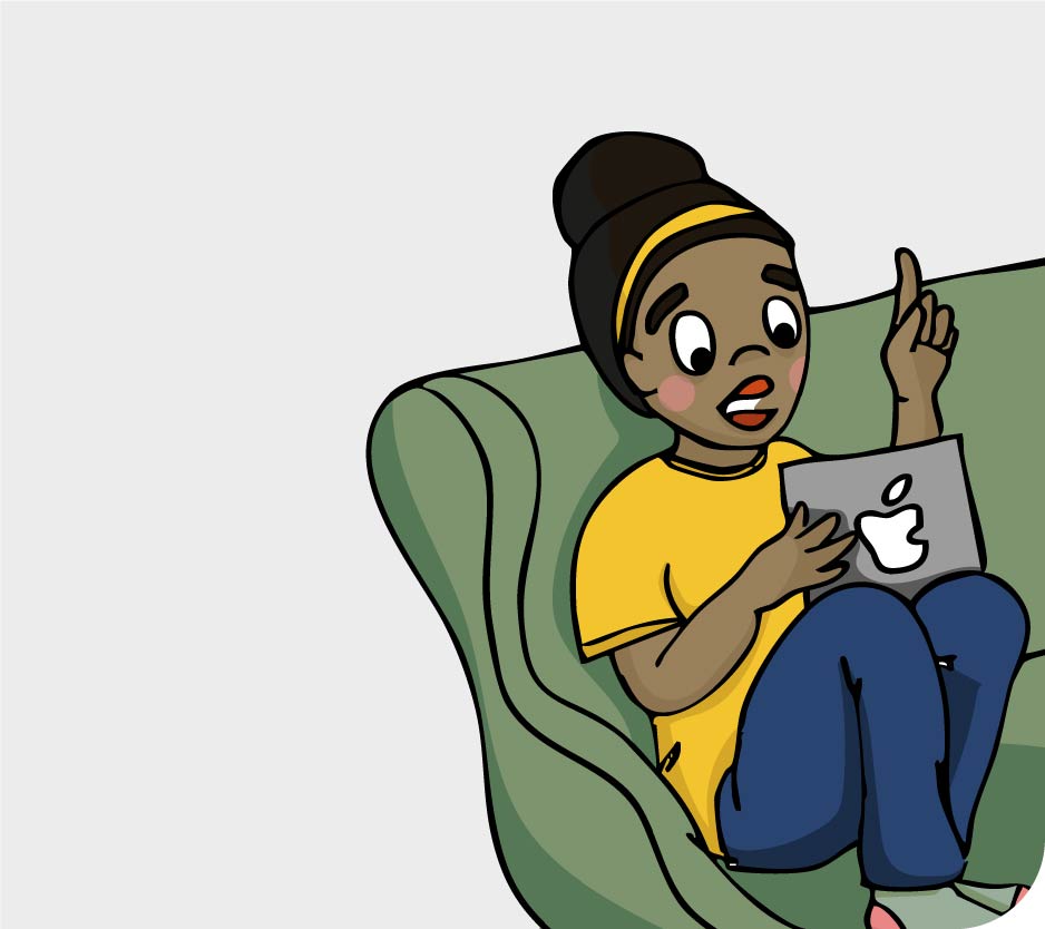 Mia sitzt im Sessel mit Laptop